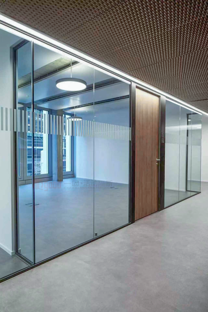 Premium office partition system by Egood, combining black aluminum frames with glass panels and integrated wooden doors.